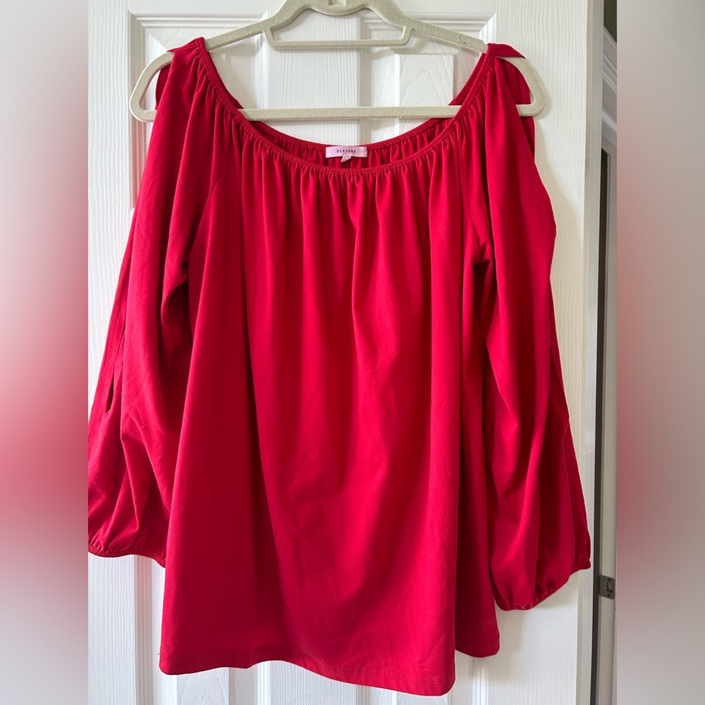 Lovely red top with open arm slits. Size XL.